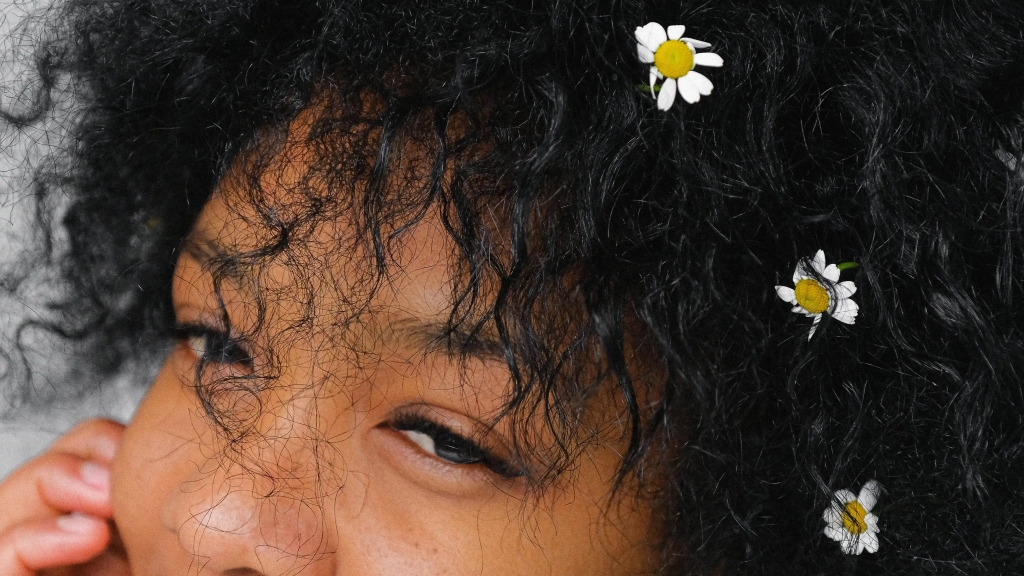 “Embracing Your Coils: A Loving Care Routine for Coily Hair”